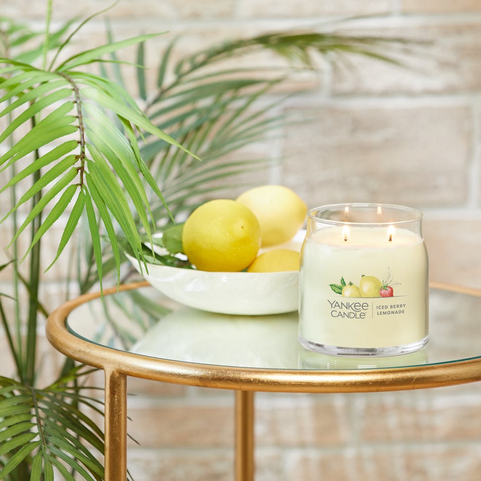 iced berry lemonade signature medium jar candle on table