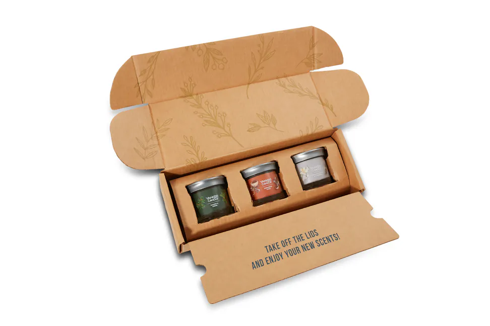 Build-Your-Own Fragrance Box featuring a balsam & cedar signature small tumbler candle, a cinnamon stick signature small tumbler candle, and a smoked vanilla & cashmere signature small tumbler candle