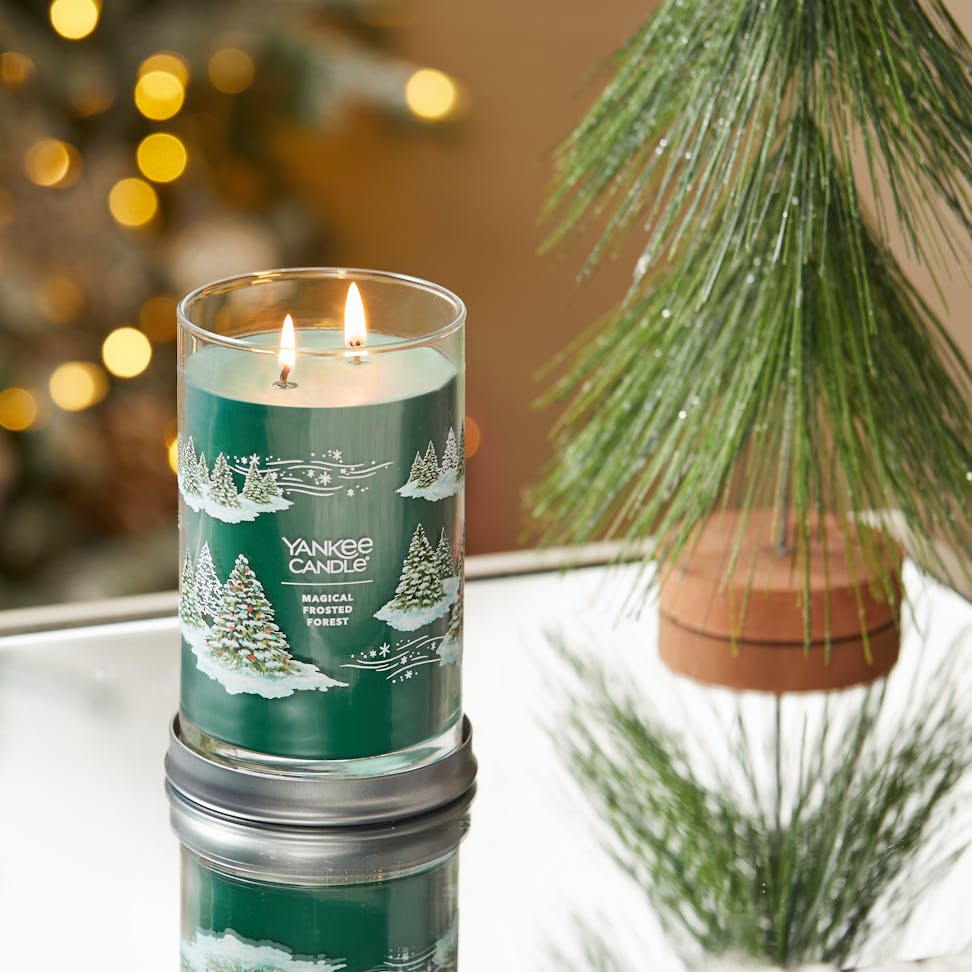magical frosted forest signature large tumbler candle on table