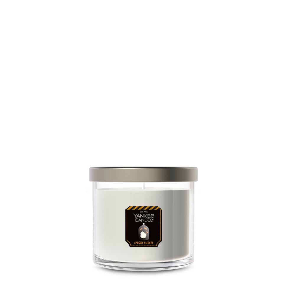 Single wick white wax candle in clear glass jar with metallic lid, perfect for home decor and relaxation.