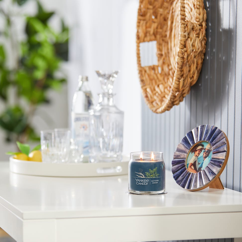 bayside cedar signature medium jar candle on table