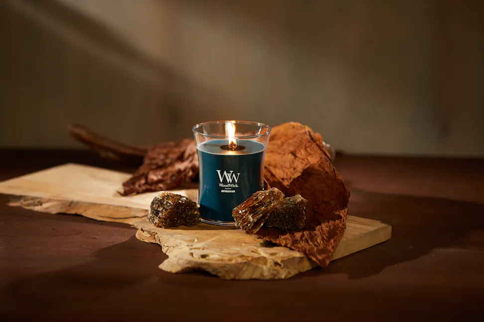 WoodWick Enchanted Destinations Collection Antiquarium Medium Hourglass Candle on a table