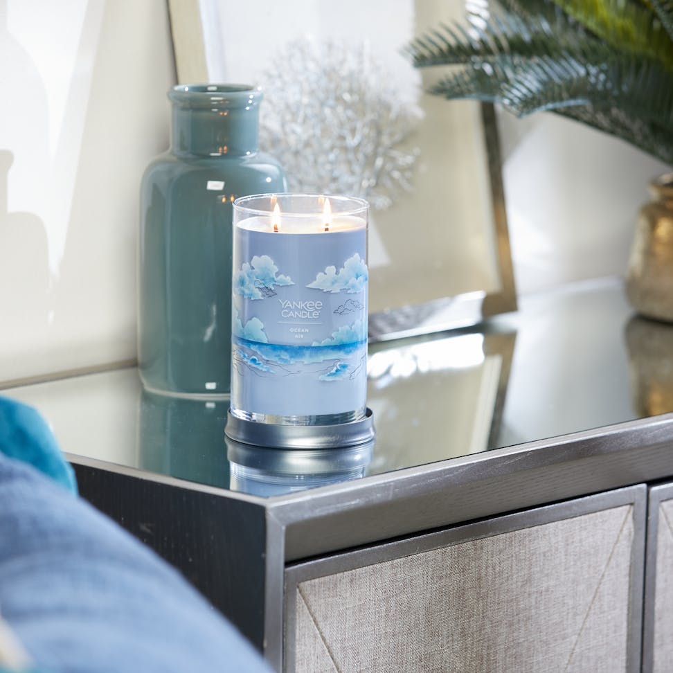 ocean air signature large tumbler candle on table