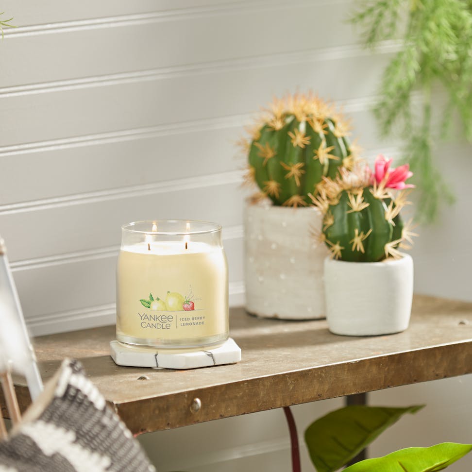 iced berry lemonade signature medium jar candle on table