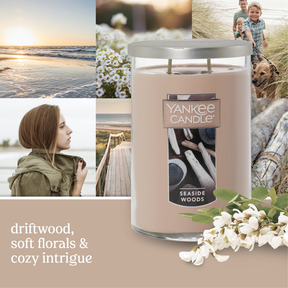 Yankee Candle in seaside wood scent with fall beach  imagery behind
