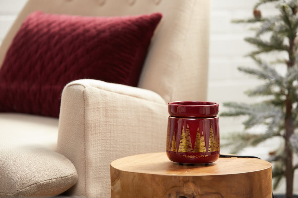golden pines wax melt warmer on table