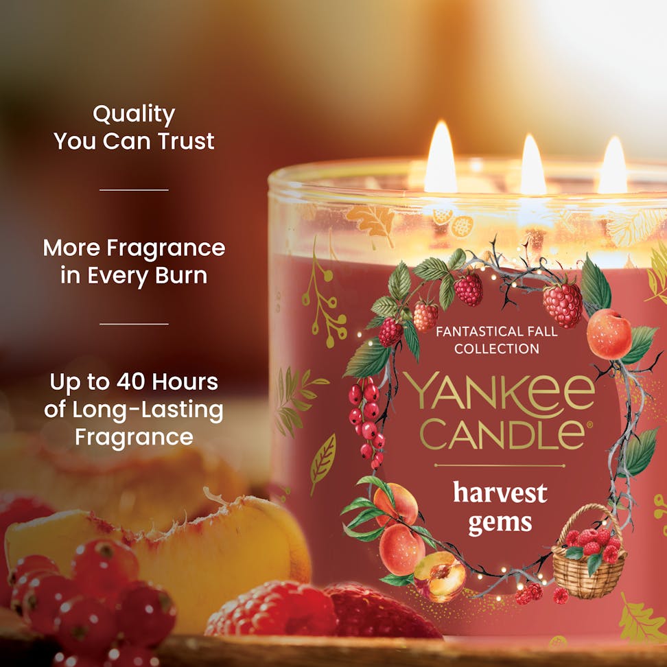 Fall scented candle with fruits, text highlights quality, fragrance strength, and 40 hour long-lasting burn time