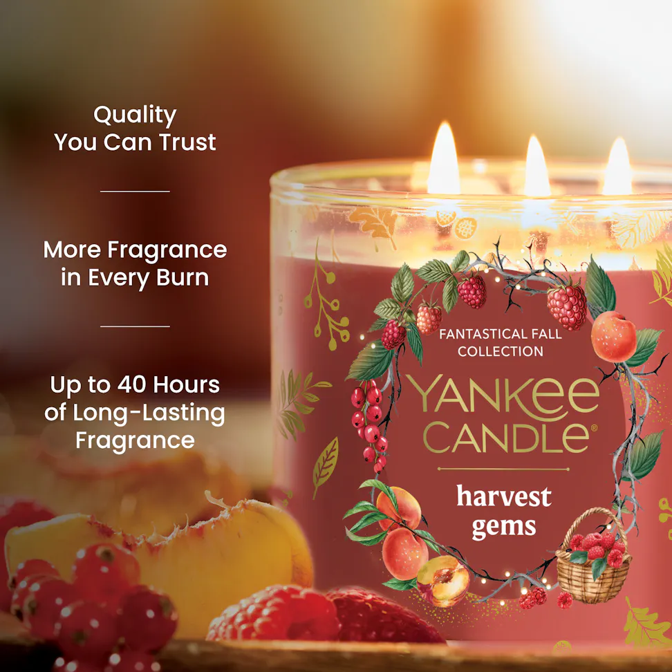 Fall scented candle with fruits, text highlights quality, fragrance strength, and 40 hour long-lasting burn time