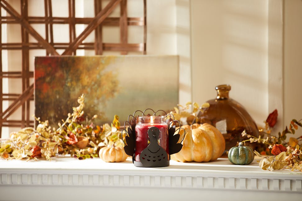 turkey leaves jar candle holder on mantle holding an original large jar candle