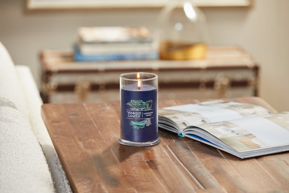 lakefront lodge signature medium perfect pillar tumbler candle on table