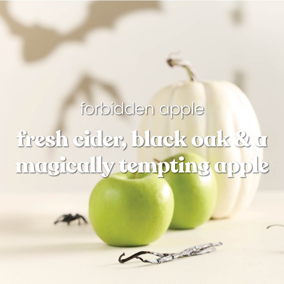 Green apples and a white pumpkin with text about fresh cider, black oak, and a magically tempting apple aroma.