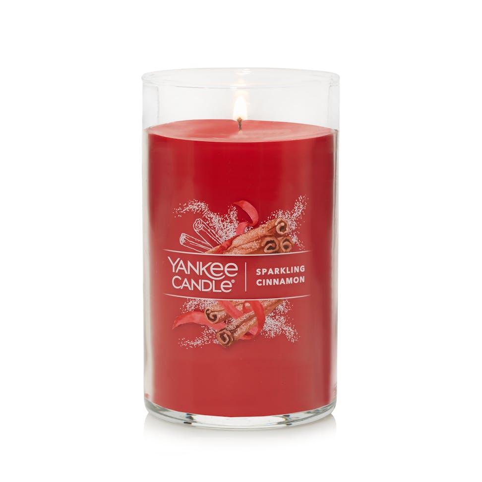 lit sparkling cinnamon signature medium pillar candle