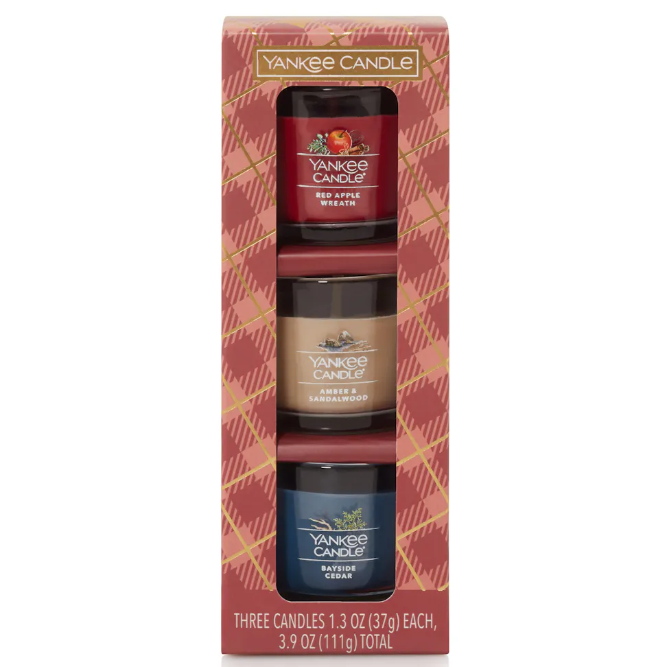 Sweater Weather Yankee Candle Minis Gift Set featuring the fragrances of Red Apple Wreath, Amber & Sandalwood, and Bayside Cedar