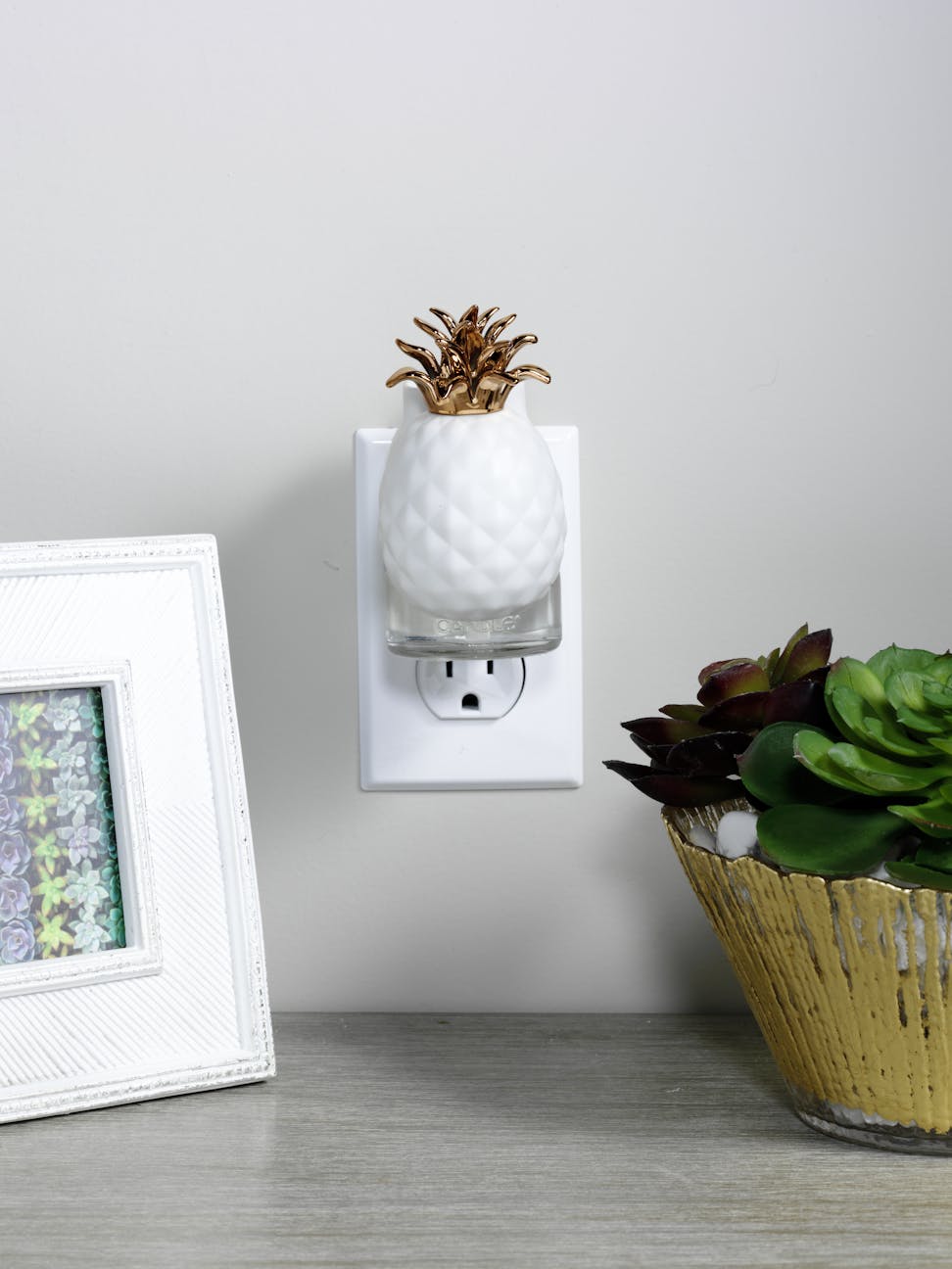 pineapple with light scentplug diffusers in socket