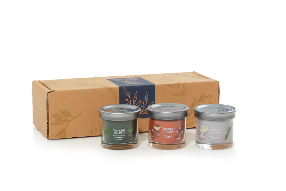 Build-Your-Own Fragrance Box featuring a balsam & cedar signature small tumbler candle, a cinnamon stick signature small tumbler candle, and a smoked vanilla & cashmere signature small tumbler candle