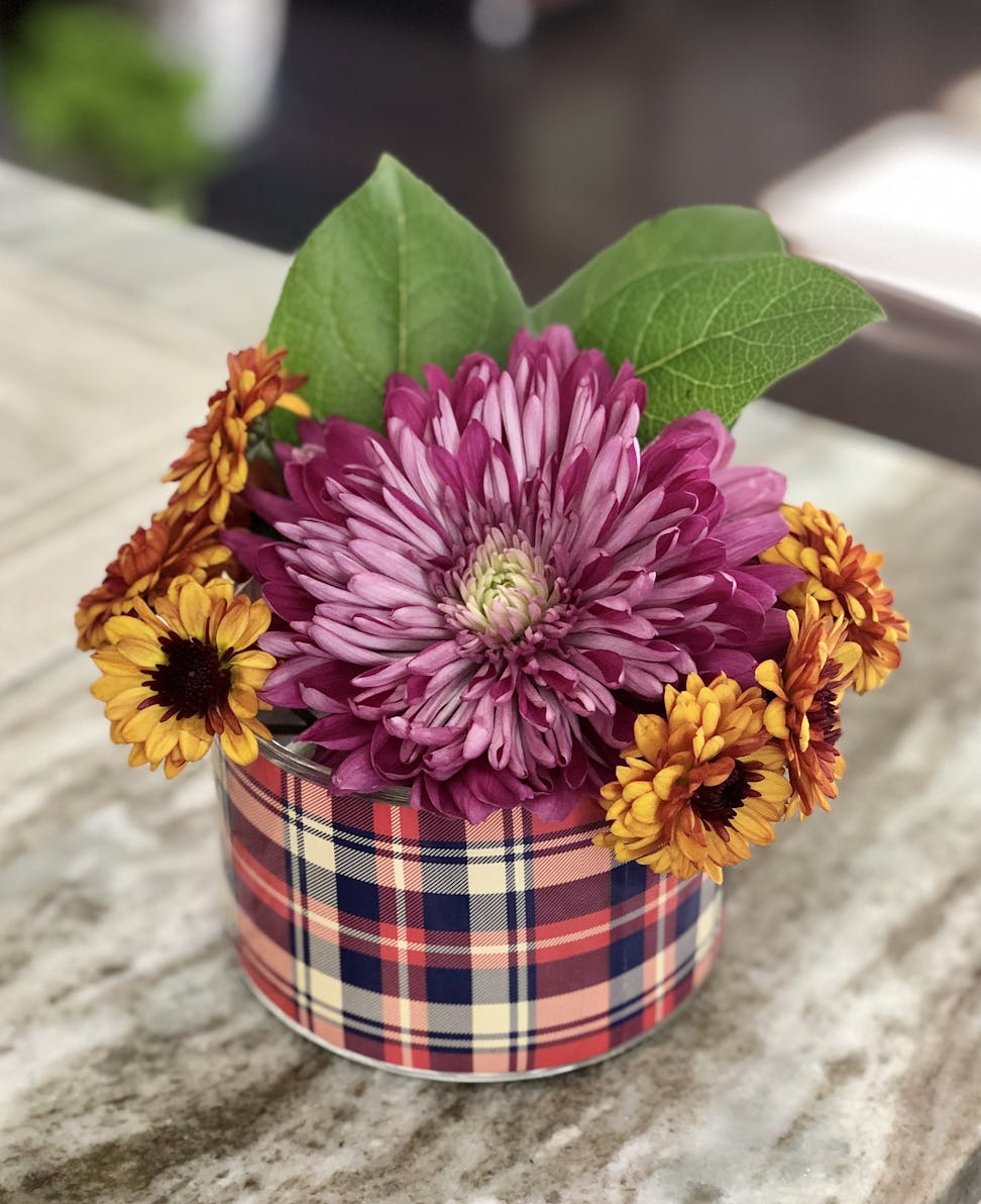reusable candle container as flower holder