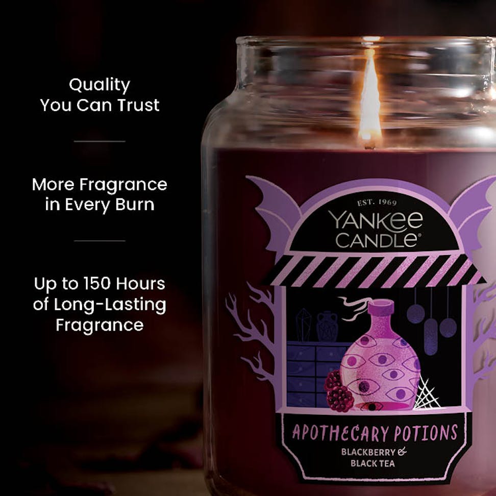 Large purple scented candle in glass jar with apothecary label, text highlights long-lasting fragrance benefits