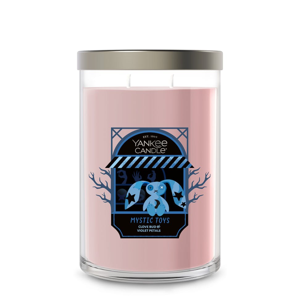 Large pink two-wick jar candle with playful blue bunny label, home decor and aromatherapy accent