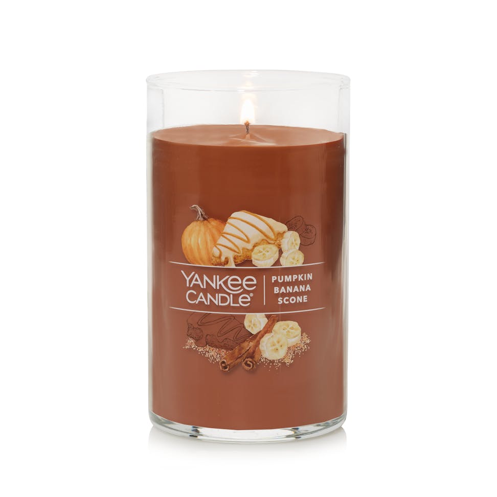 lit pumpkin banana scone signature medium pillar candle